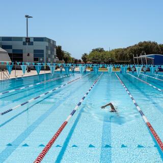 Swimmer in the outdoor lap pool at Aqua Jetty.