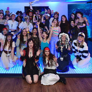 a group of people posing for a photo