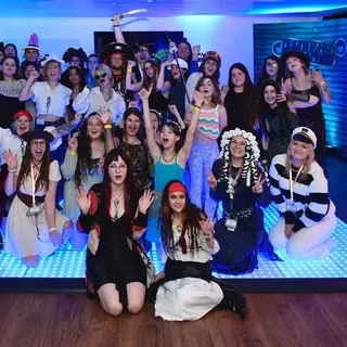 a group of people posing for a photo