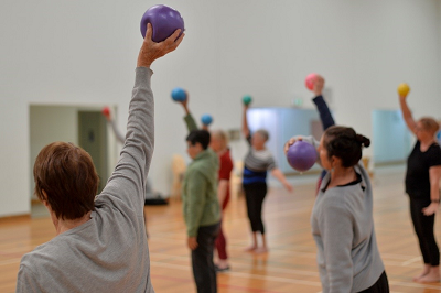 Seniors exercising as part of the social and wellbeing program