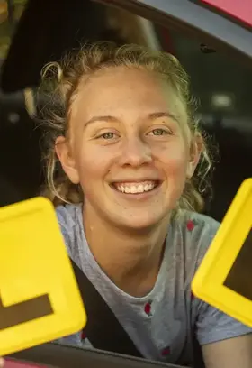 Teenage-Girl-Celebrating-Learning-to-Drive-Landing-Image.png