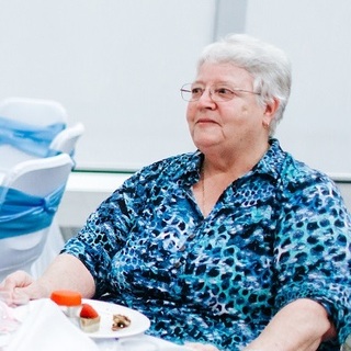 a man and woman sitting at a table