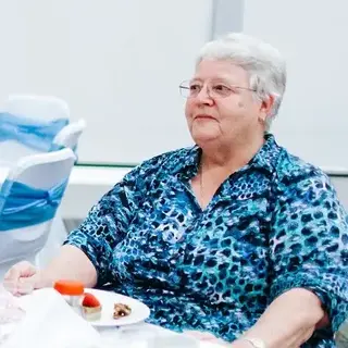 a man and woman sitting at a table