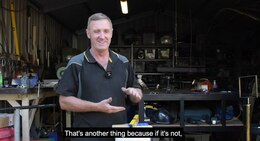 a man standing in a garage