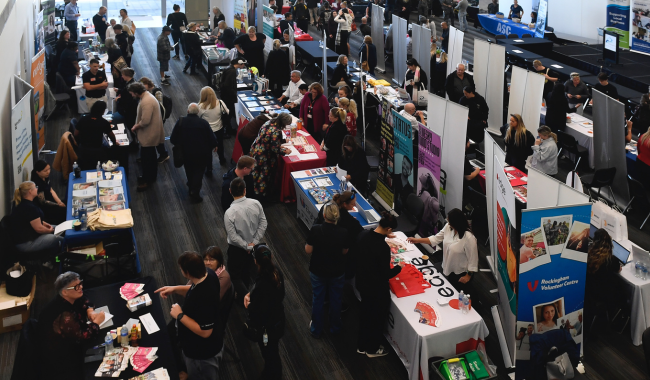 a group of people at a convention