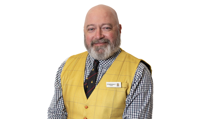 a man in a yellow vest