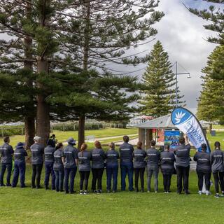 a group of people standing in a line