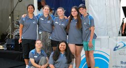 a group of people young posing for a photo