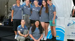 a group of people young posing for a photo