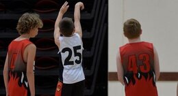 a group of boys in a basketball uniform