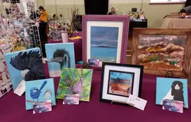 a table with paintings on it