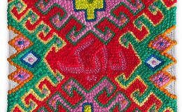 a colorful rug with a pattern