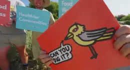 a man holding up signs